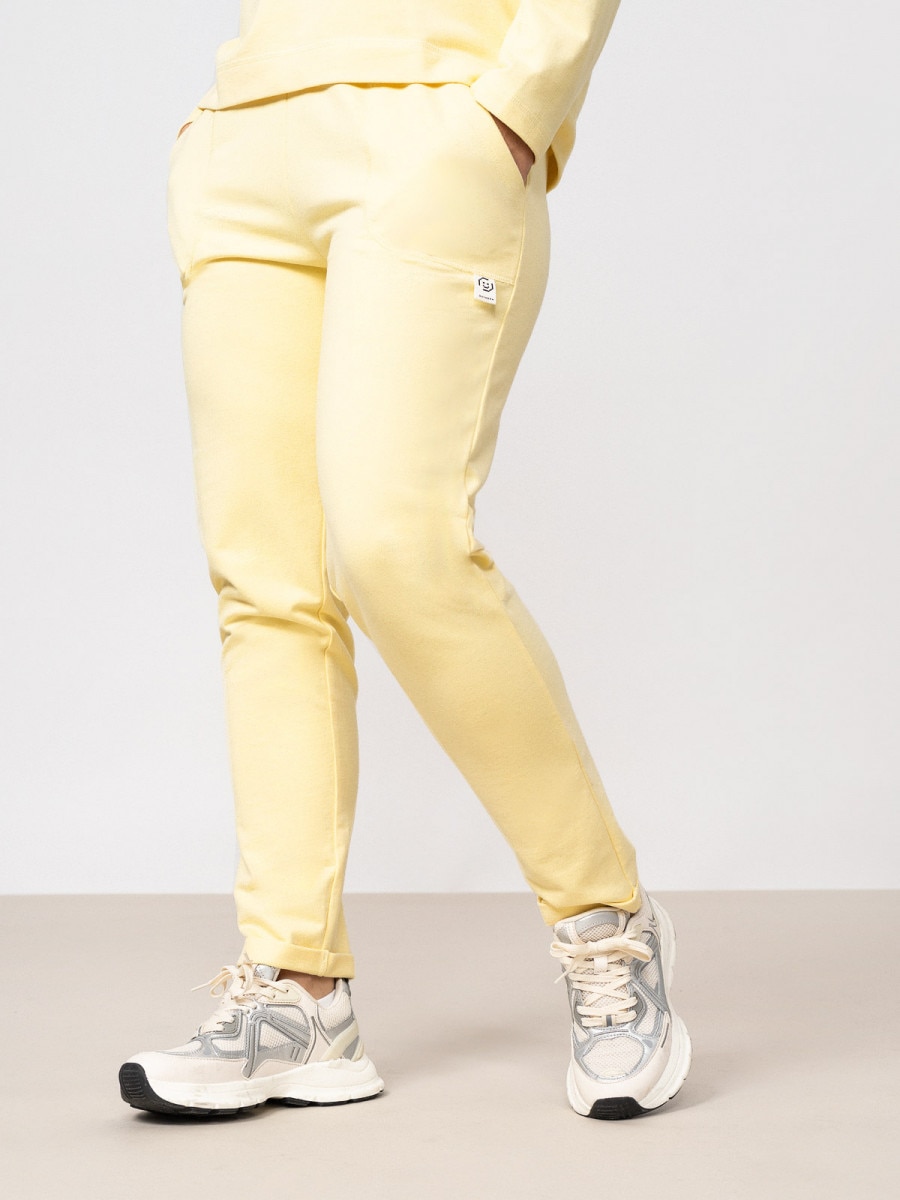 OUTHORN Spodnie dresowe damskie - żółte Jasny żółty 2