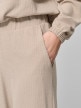 OUTHORN Spodnie z szerokimi nogawkami z dzianiny waflowej damskie - beżowe Beż 3
